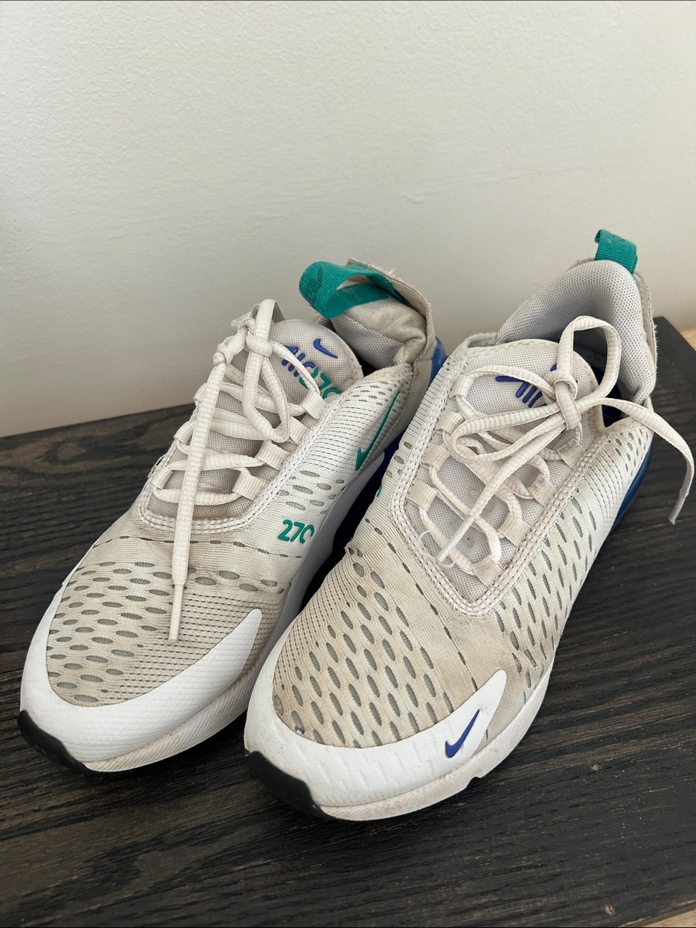 Nike Air 270s Sneakers with Teal and Blue Accents. Comfortable and lightweight.